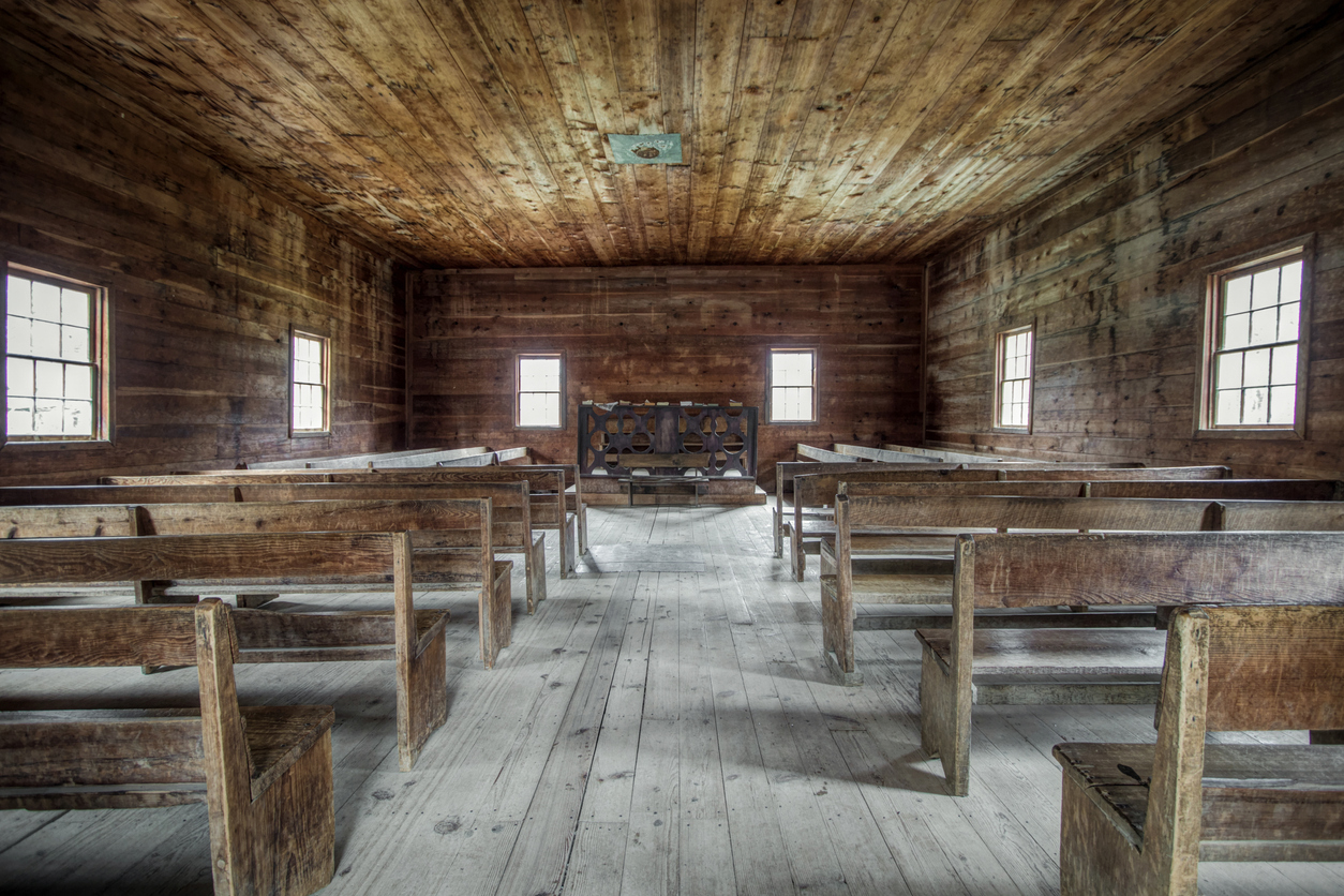 Empty church interior of a historical pioneer church in the Great Smoky Mountains National Park In Southern Tennessee.